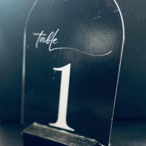Black arched white font table number